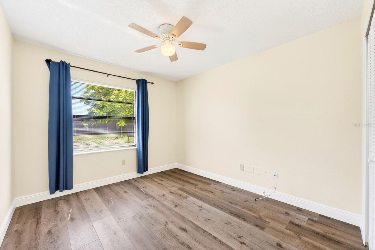 Photo 15 of 20: Perfectly sized, Bedroom 3 can easily serve as a guest bedroom or be transformed into an office or creative retreat.