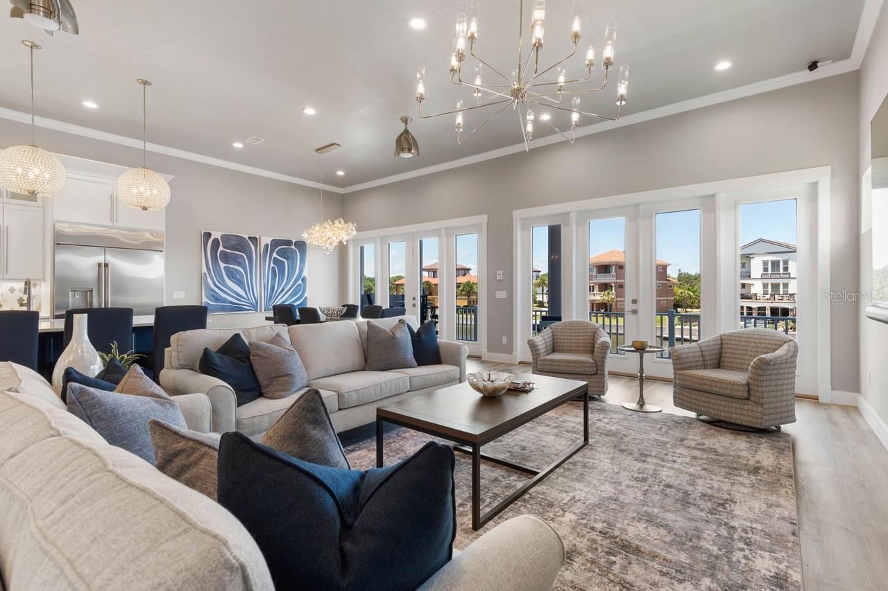 Photo 2 of 20: Sophisticated open-concept living spaces blend modern elegance with effortless comfort, creating a stunning backdrop for unforgettable gatherings and relaxed coastal living.
