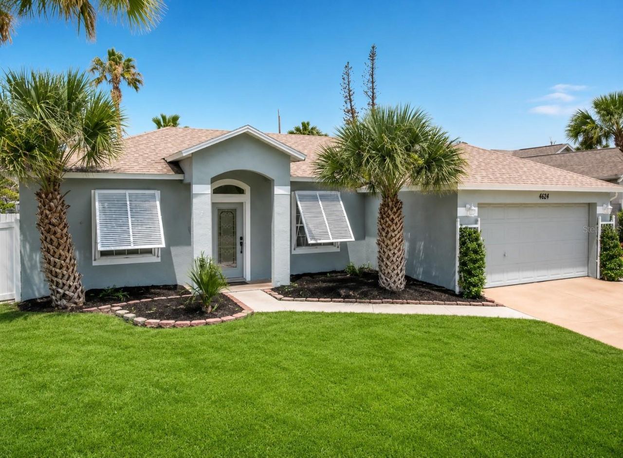 Photo 2 of 20: Front View 2- The grass color has been enhanced due to drought