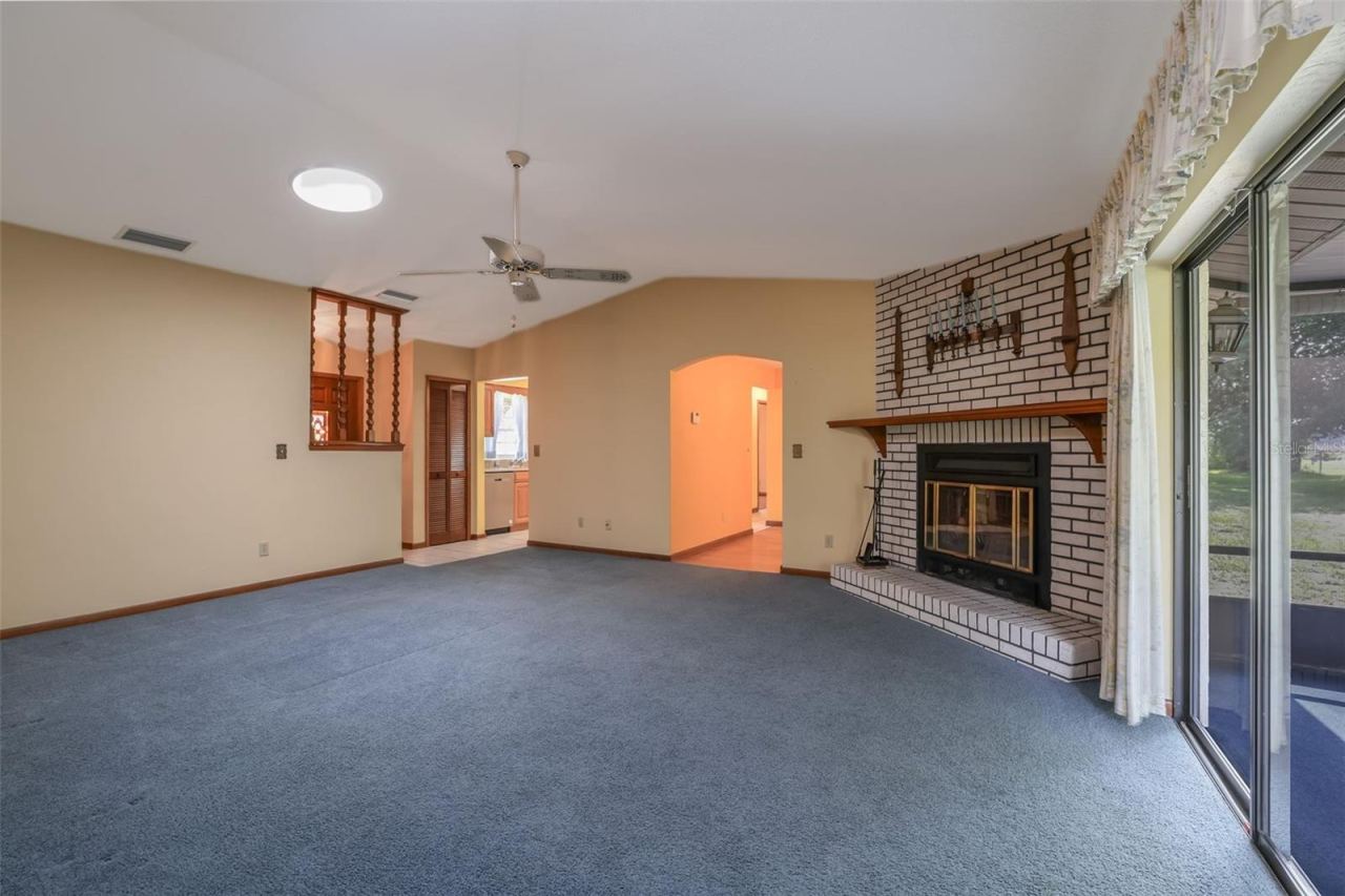 Photo 6 of 20: Living Room with Wood-burning Fireplace
