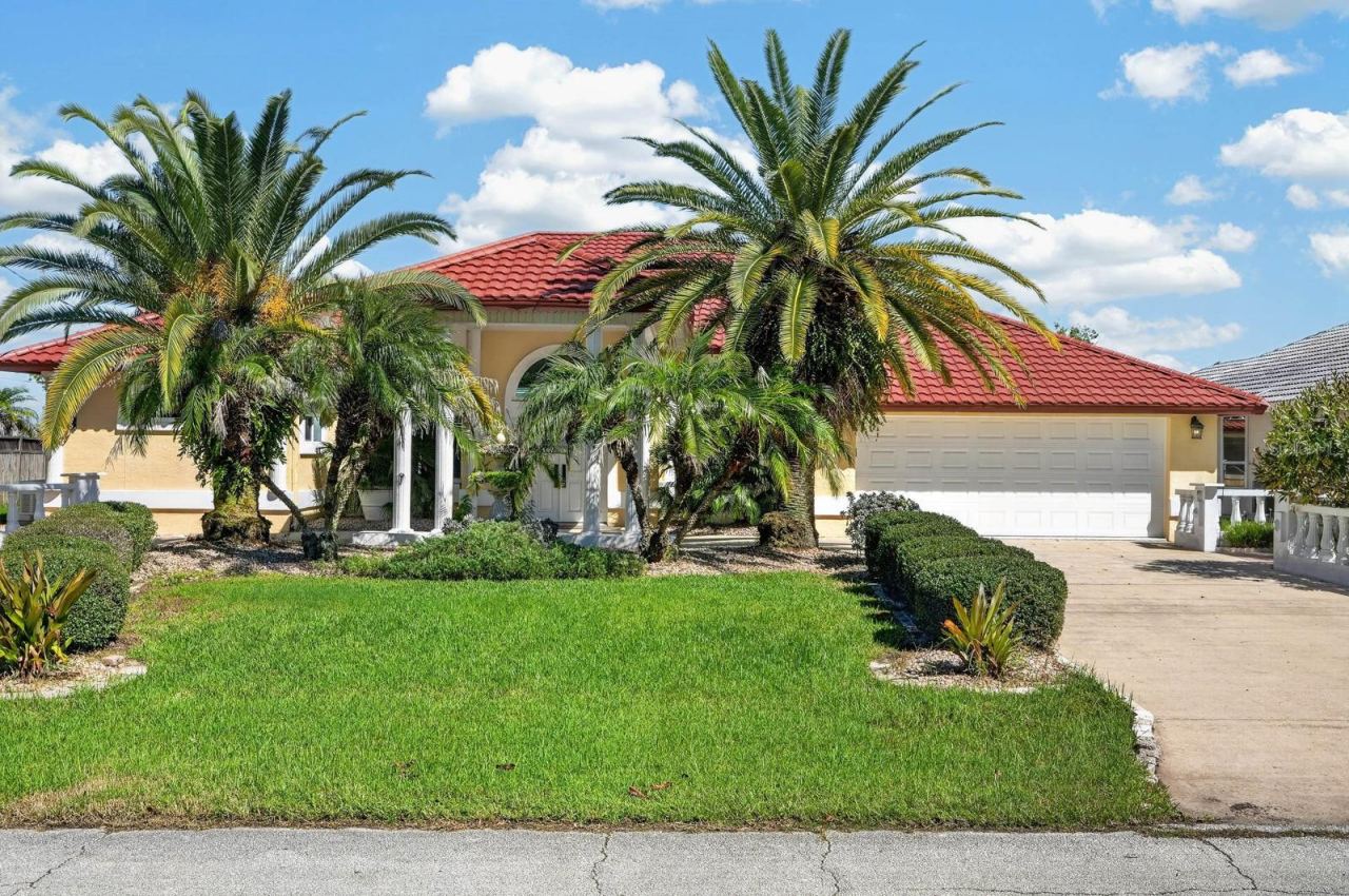 Photo 5 of 20: Beautiful Home with Tropical Landscaping