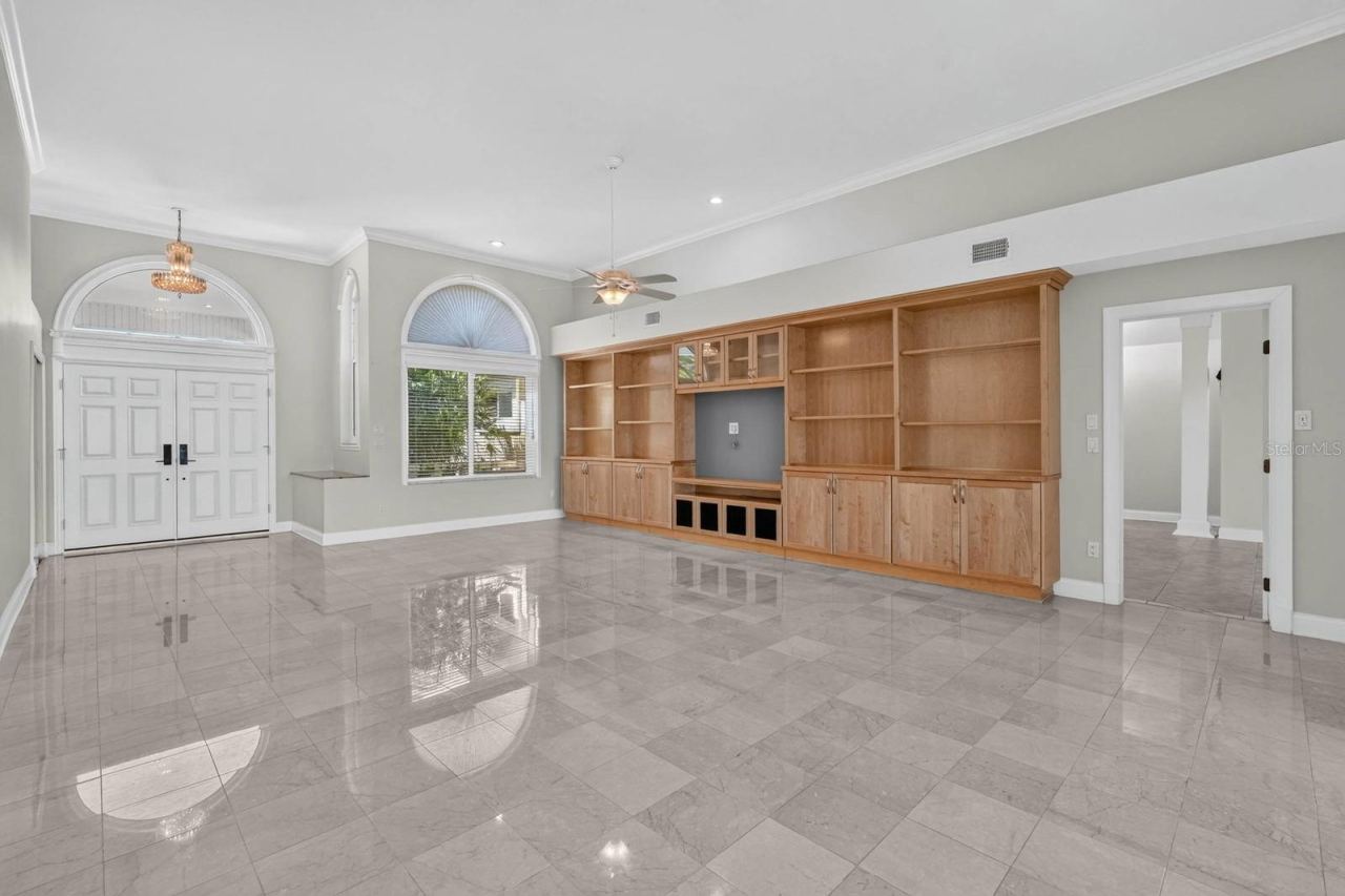 Photo 13 of 20: Custom Built-Ins and Marble Flooring