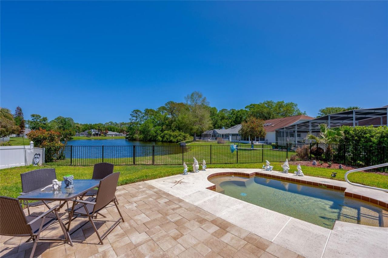 Photo 7 of 20: And... you have a beautiful water view behind the home.