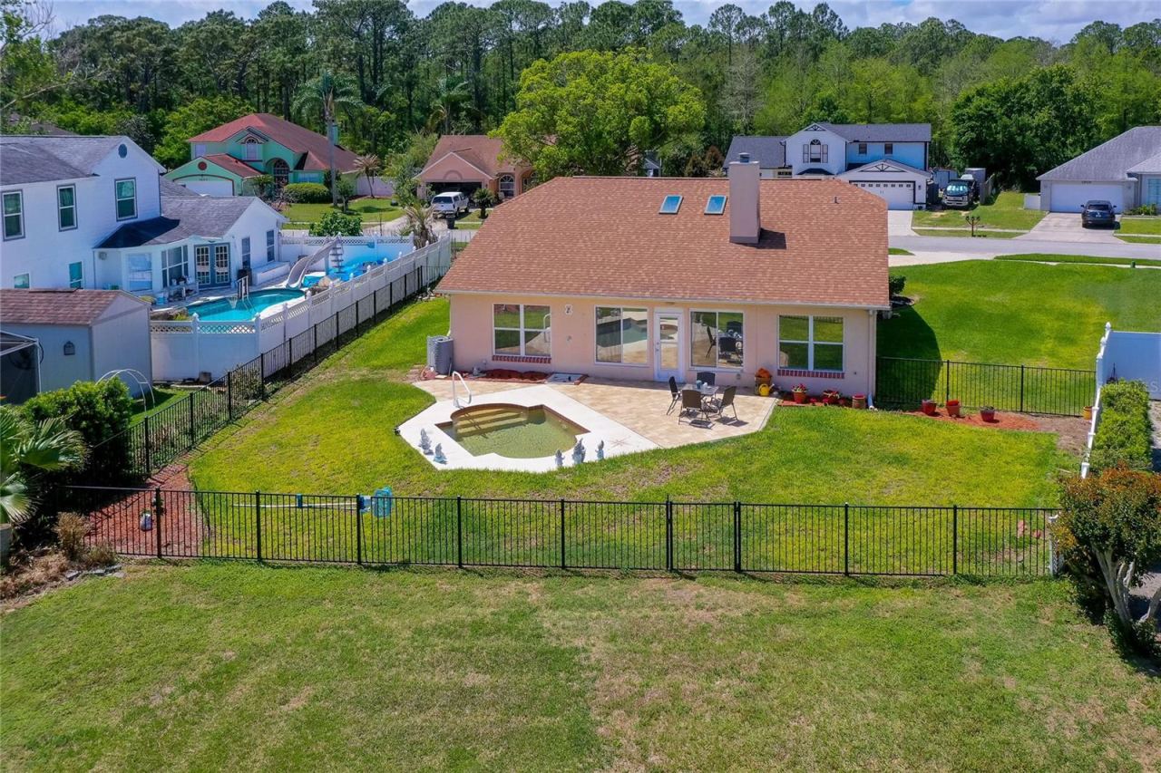 Photo 5 of 20: Fenced backyard with pool