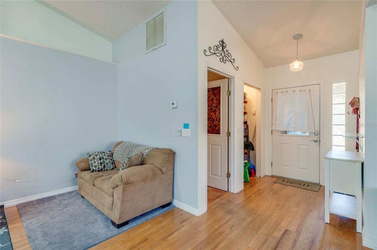 Photo 16 of 20: Living room on the left, entry on the right