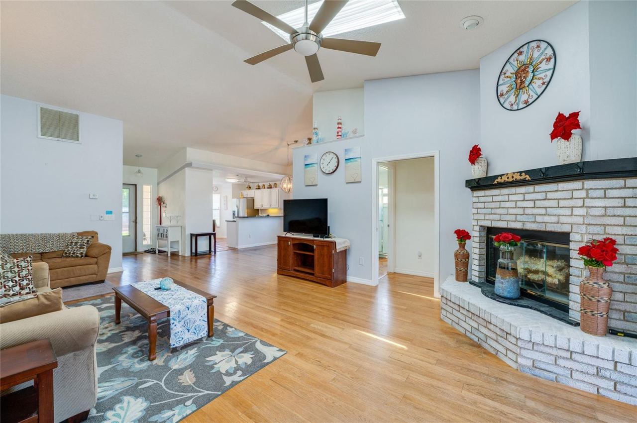 Photo 15 of 20: Living room with wood-burning fireplace