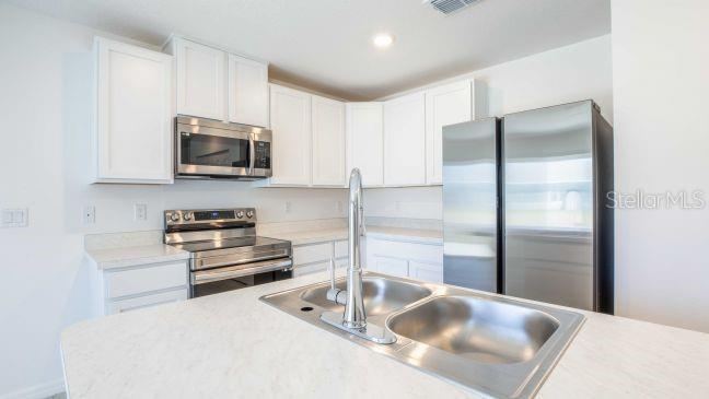 Photo 9 of 20: Model home - actual features may vary.