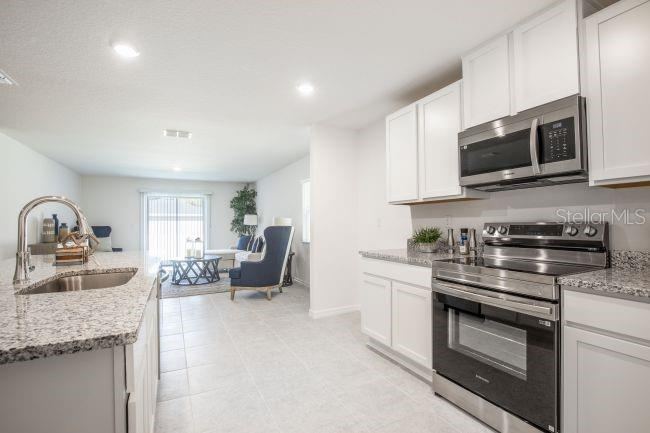 Photo 11 of 20: Model home - actual features may vary.