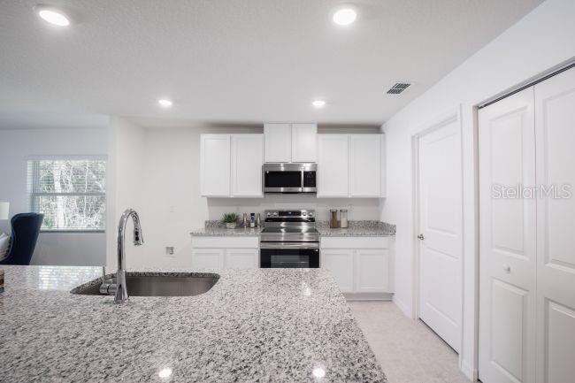 Photo 10 of 20: Model home - actual features may vary.