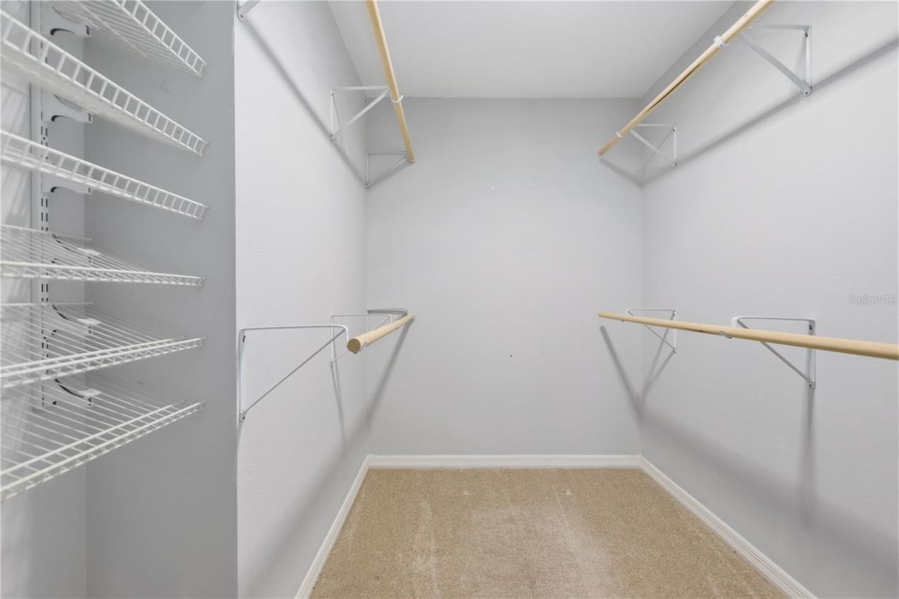 Photo 18 of 20: Primary Bedroom Closet