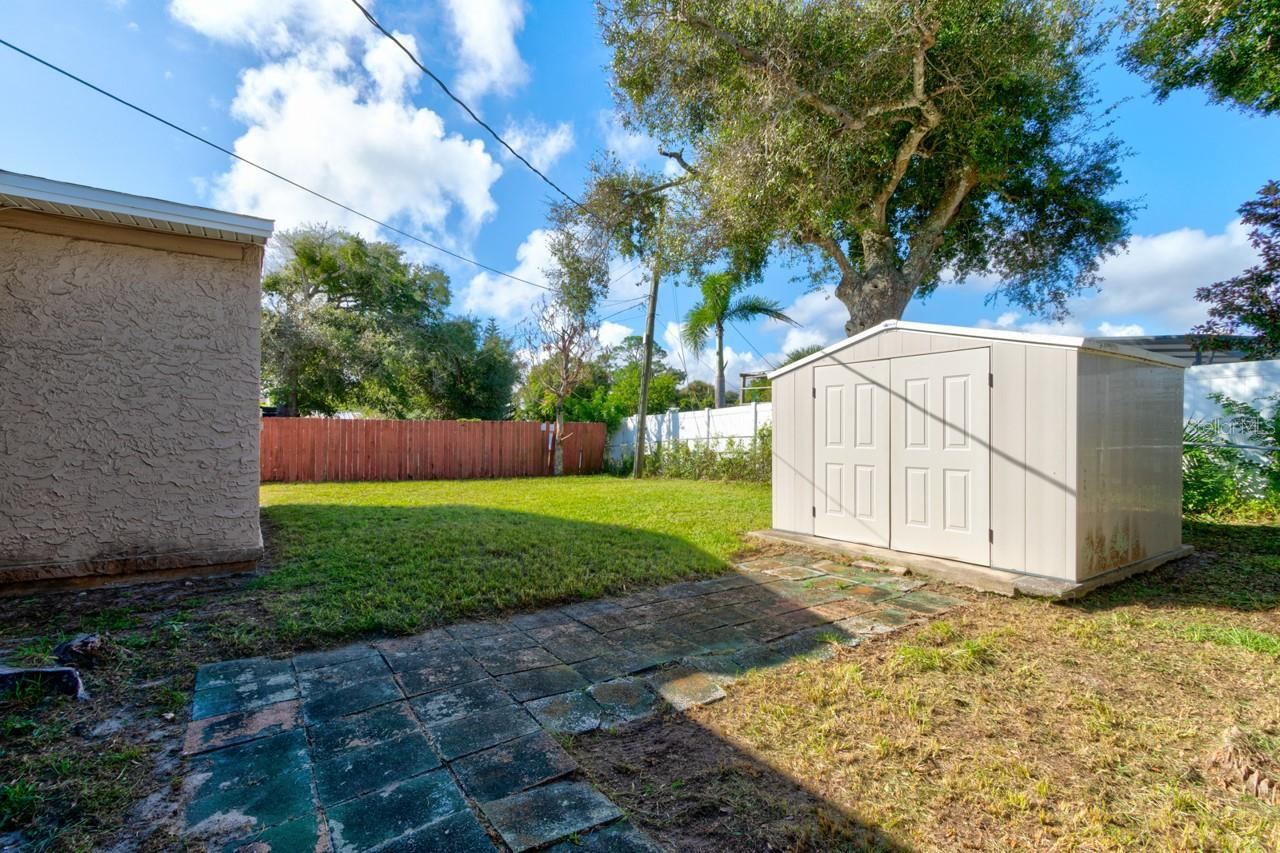 Photo 15 of 20: Spacious shed in rear yard