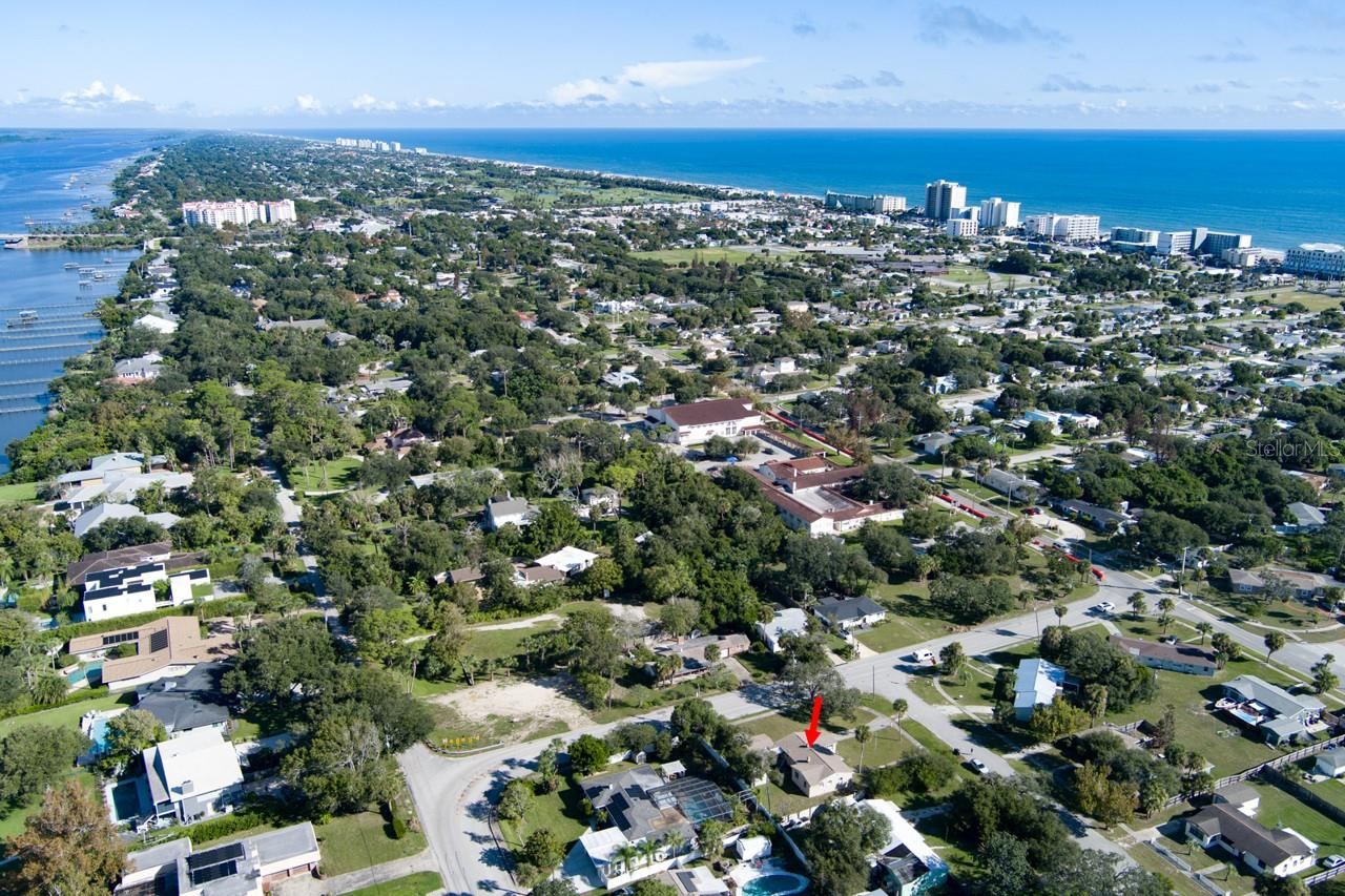 Photo 2 of 20: Aerial view of home location between Beach and Halifax River