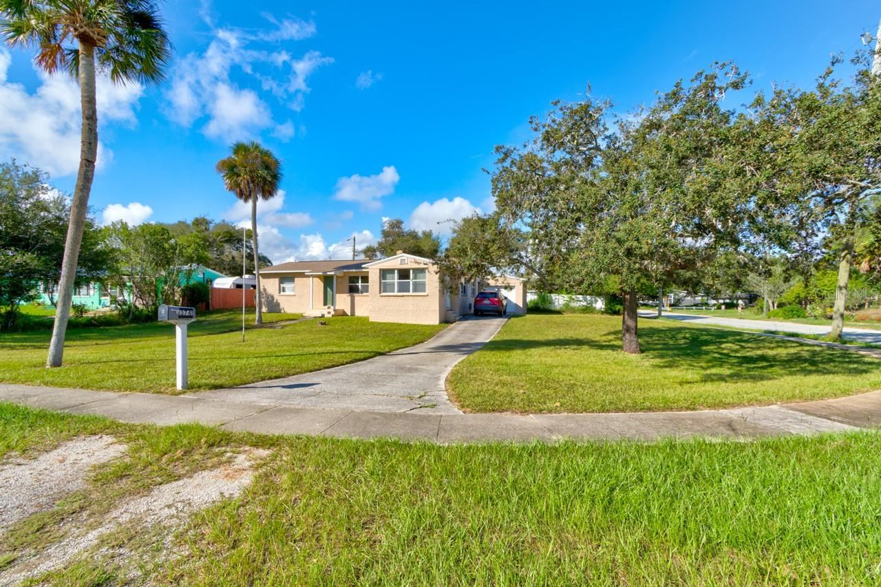 Photo 4 of 20: Front and side of home on large corner lot