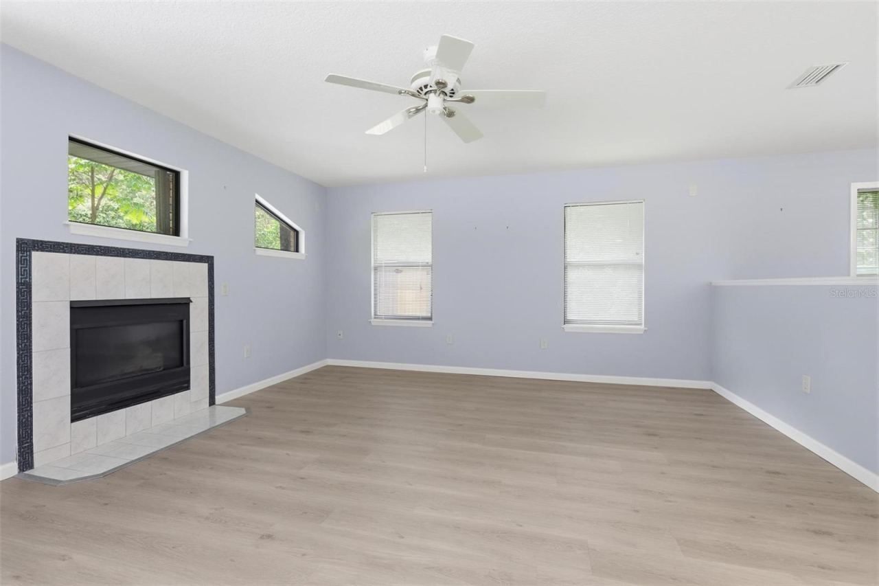 Photo 19 of 20: Family room with fireplace.