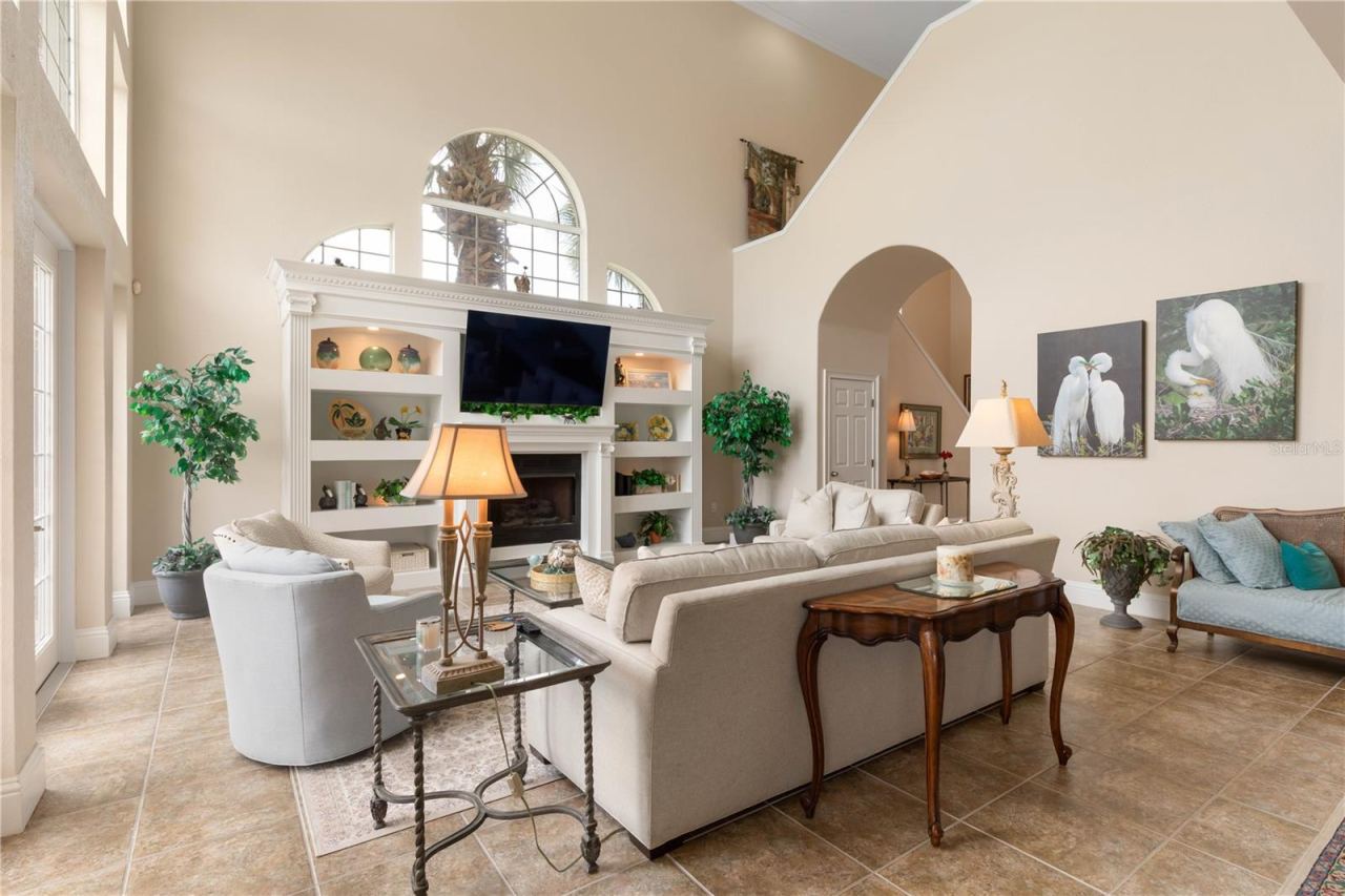 Photo 20 of 20: Look up and another layer of the home reveals itself. The open stairwell connects both levels visually, allowing the spaces above and below to feel beautifully connected.