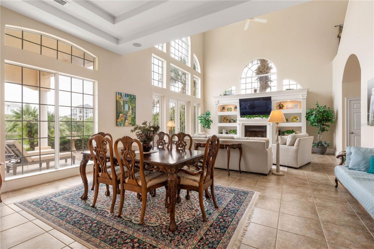 Photo 4 of 20: Dinner doesn’t have to end at the table. French doors across the rear invite you outside, creating an easy transition from dining to evenings on the covered lanai.