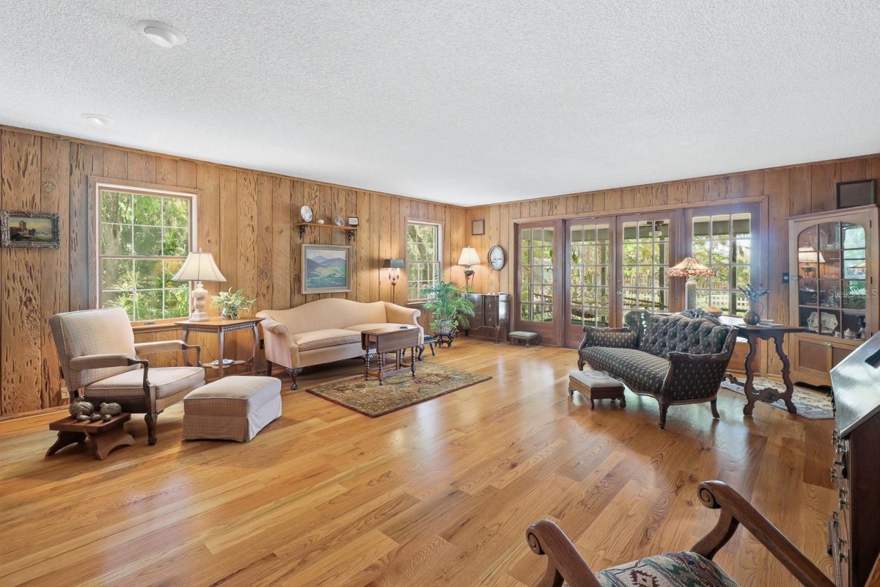 Photo 8 of 20: Wood floors with French doors leading to the back porch.