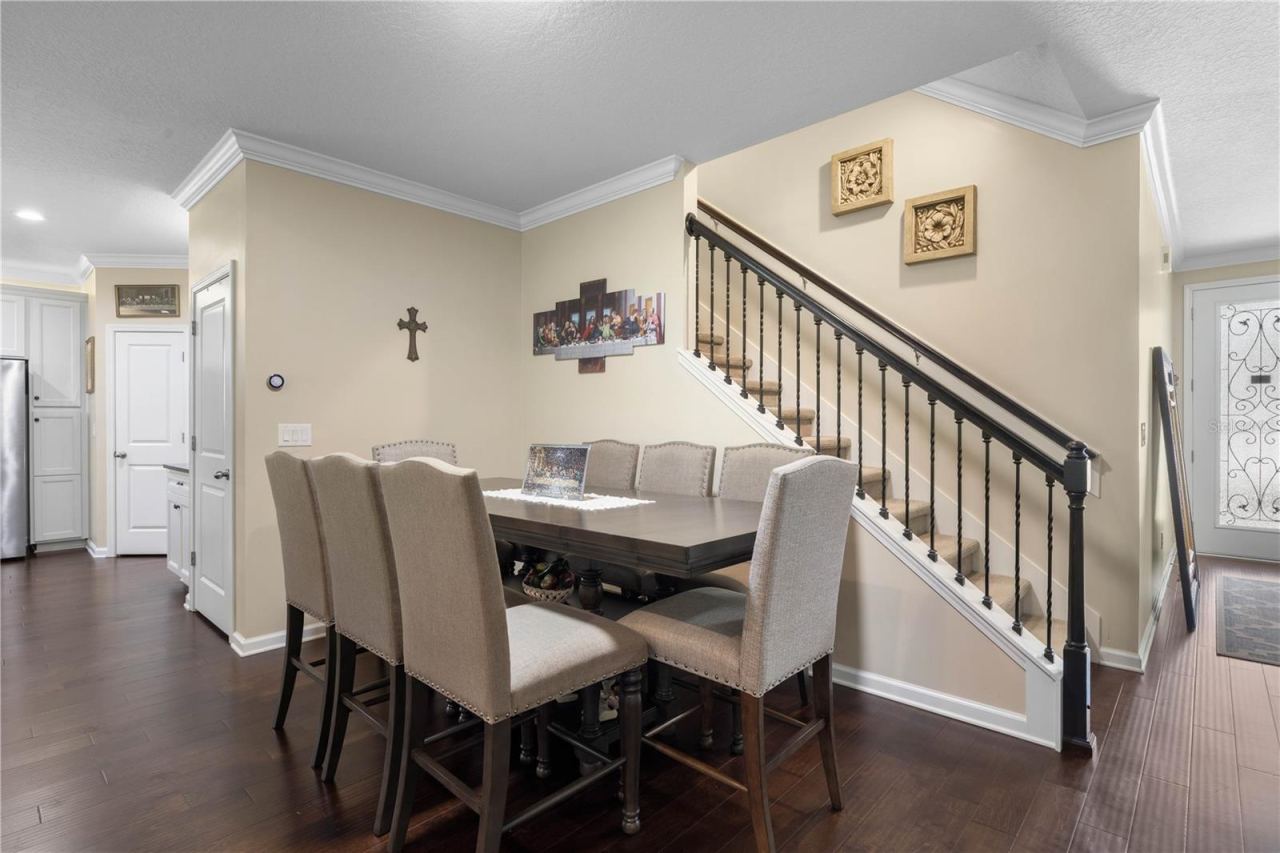 Photo 9 of 20: A cheerful spot for everything from morning coffee to family dinners, this dining area keeps everyone connected to the kitchen and the flow of the home.