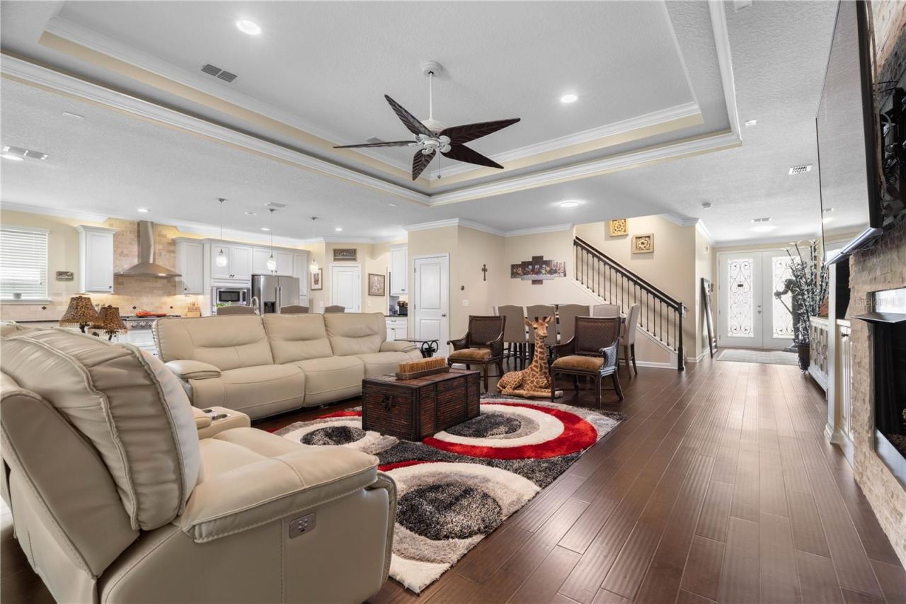 Photo 17 of 20: Hand-scraped wood flooring adds rich character underfoot, while thoughtfully placed LED lighting keeps the space bright, fresh, and beautifully illuminated.
