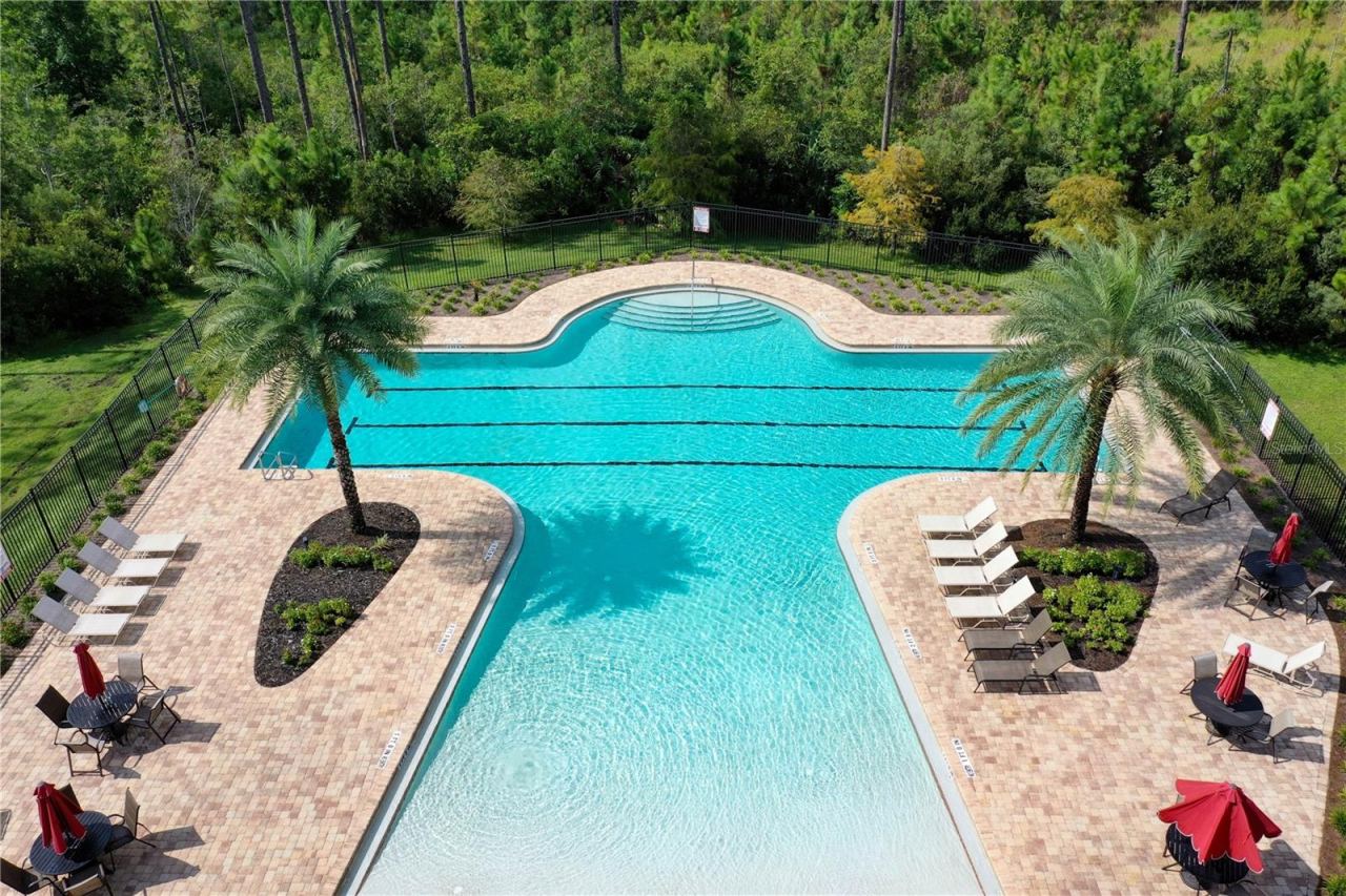 Photo 4 of 20: Make a splash close to home! The community pool offers plenty of room for swimming laps, cooling off, or simply soaking up a sunny Florida day.
