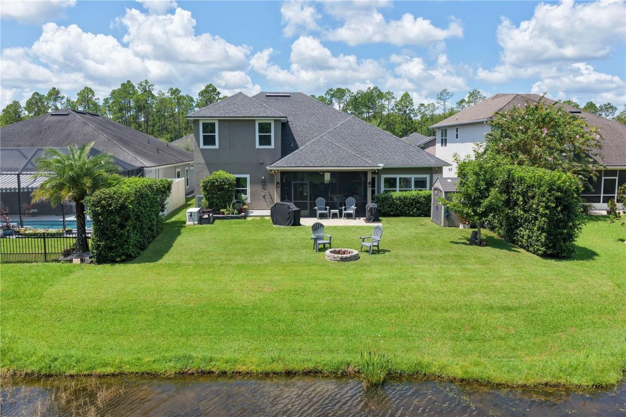 Photo 10 of 20: A backyard made for making memories—incredibly private, peaceful water views, and plenty of room to play. Even better, it’s already prewired for a future pool!