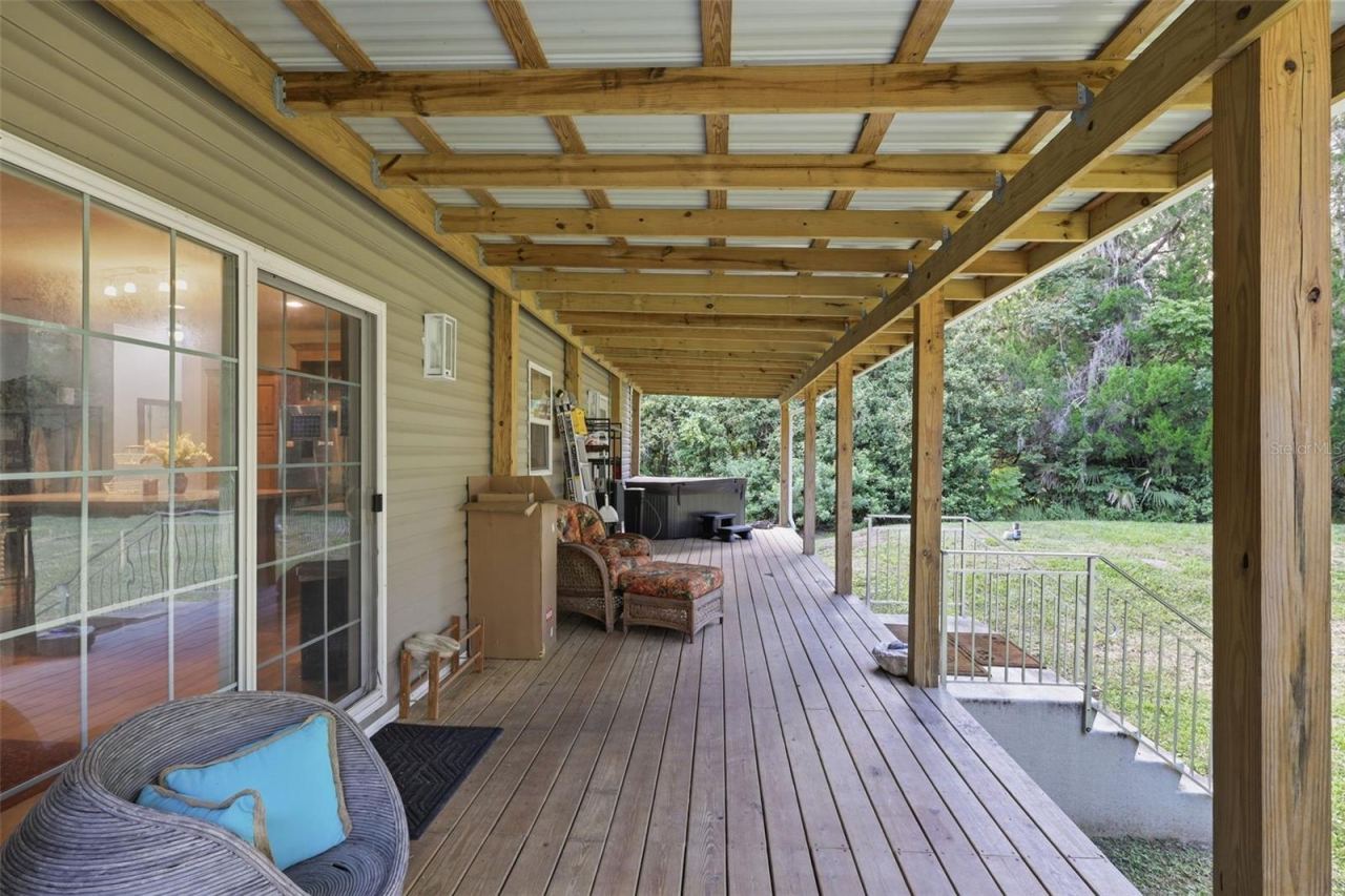 Photo 11 of 20: Full length covered rear deck