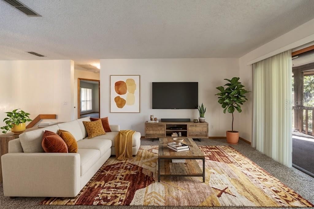 Photo 11 of 20: VIRTUALLY STAGED: Living Area With Sliders That Open Into The Screened Patio
