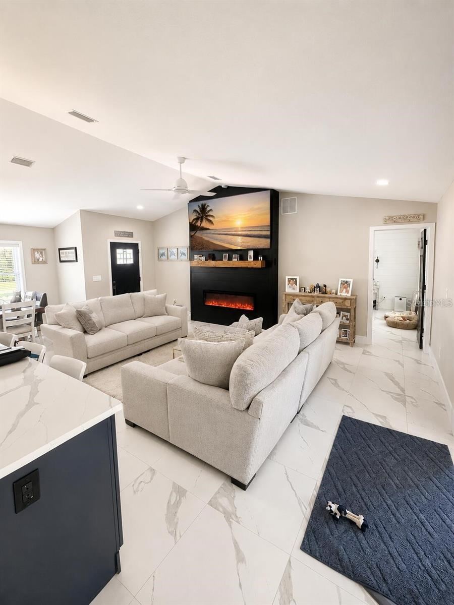 Photo 8 of 20: living room kitchen open floor plan