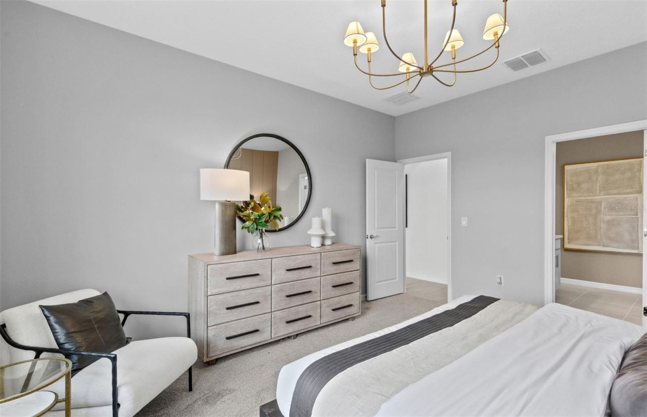 Photo 16 of 20: Model Home Design Only. Pictures and furnishings are for illustrative purposes only. Elevations, colors and options may vary. Furniture is for model home staging only.
