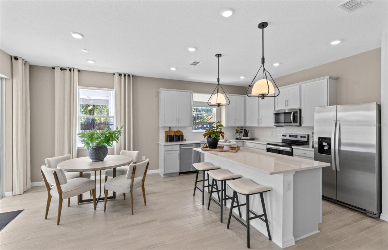 Photo 3 of 20: Model Home Design Only. Pictures and furnishings are for illustrative purposes only. Elevations, colors and options may vary. Furniture is for model home staging only.