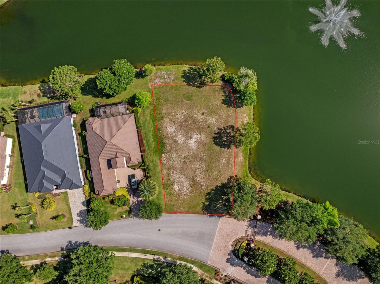 Photo 7 of 20: Aerial View of Property & Lake