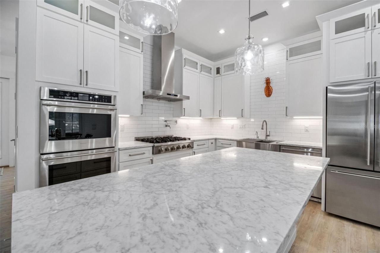 Photo 17 of 20: Chef-inspired kitchen featuring premium finishes and exceptional functionality