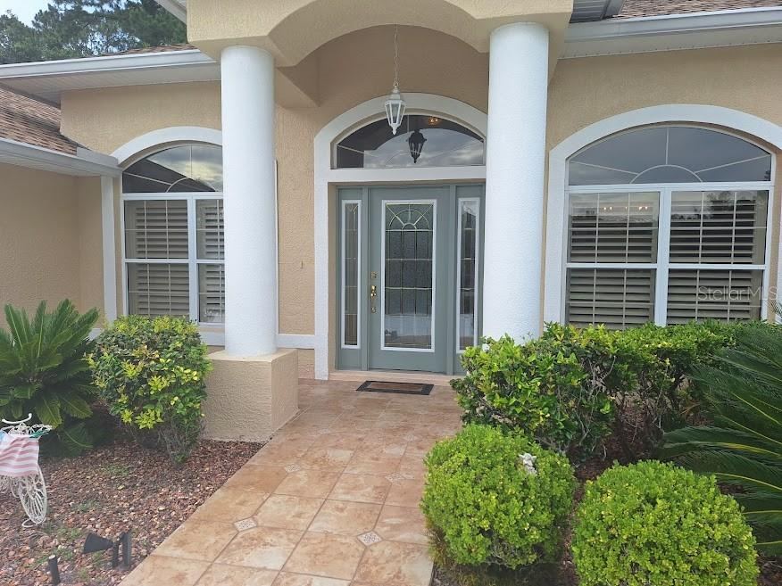Photo 2 of 20: Front entry-tile & leaded glass