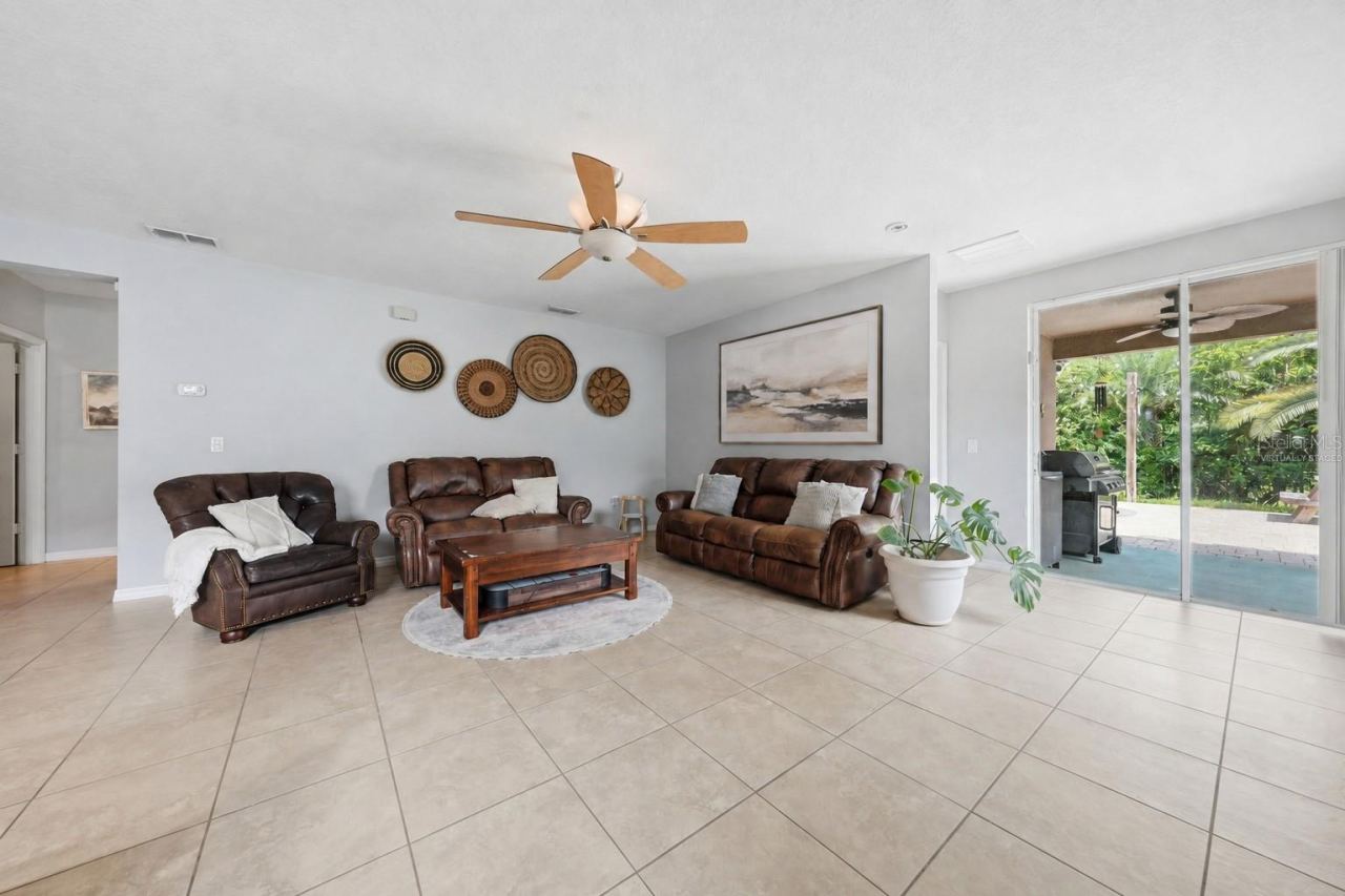 Photo 15 of 20: Sliding doors leading to your backyard oasis. Virtually staged wall art