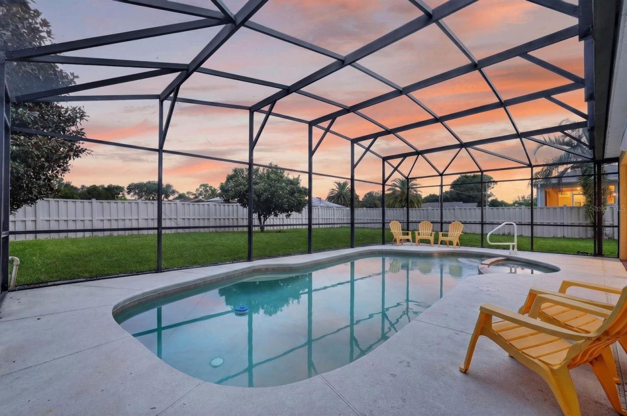 Photo 2 of 20: Screen Enclosed Heated Pool with Spa