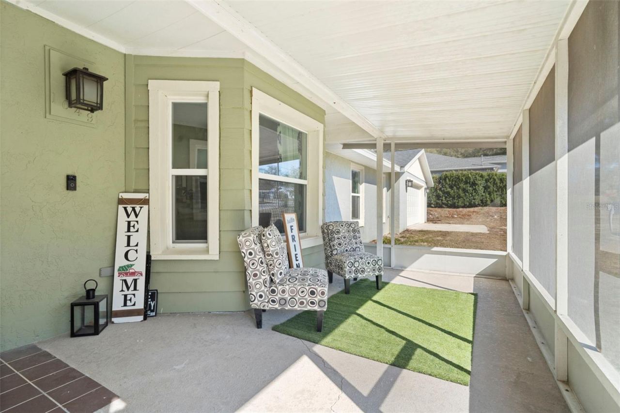 Photo 2 of 20: Screened front porch