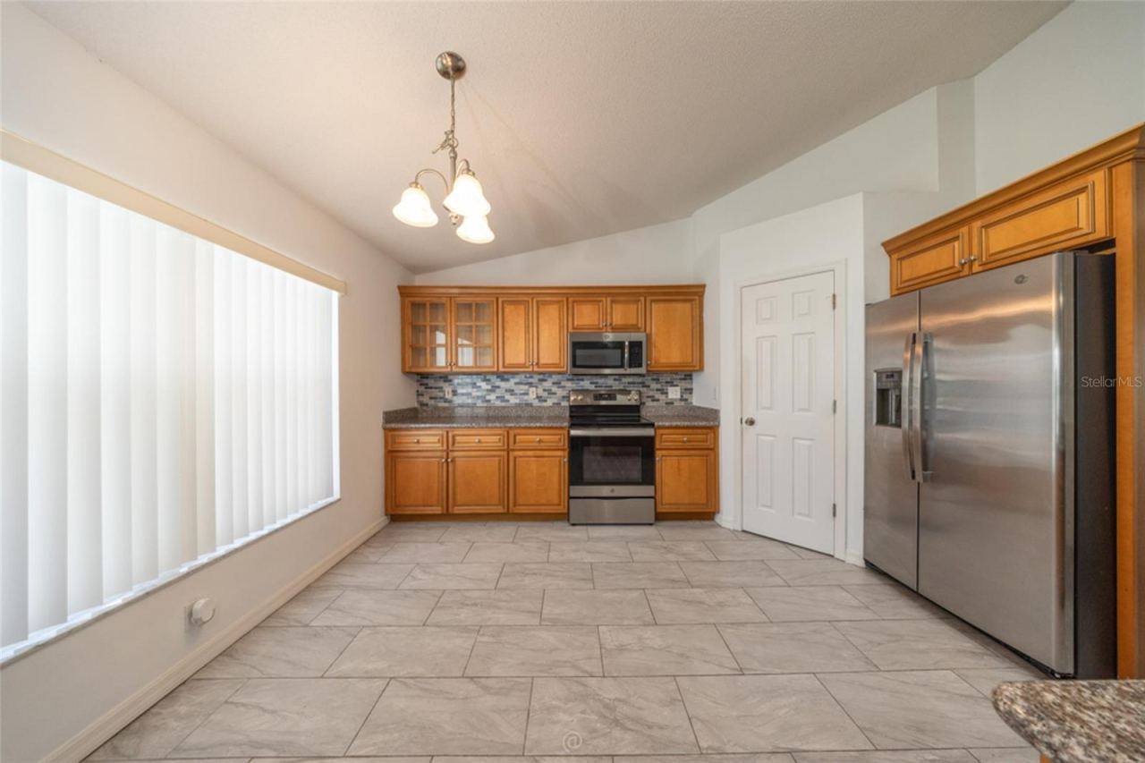 Photo 10 of 20: view from family room into the kitchen