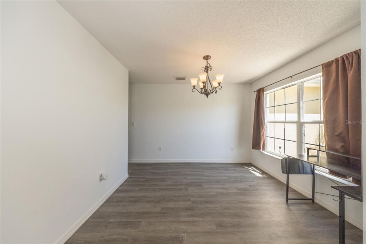 Photo 16 of 20: formal dining room near the kitchen for easy entertaining