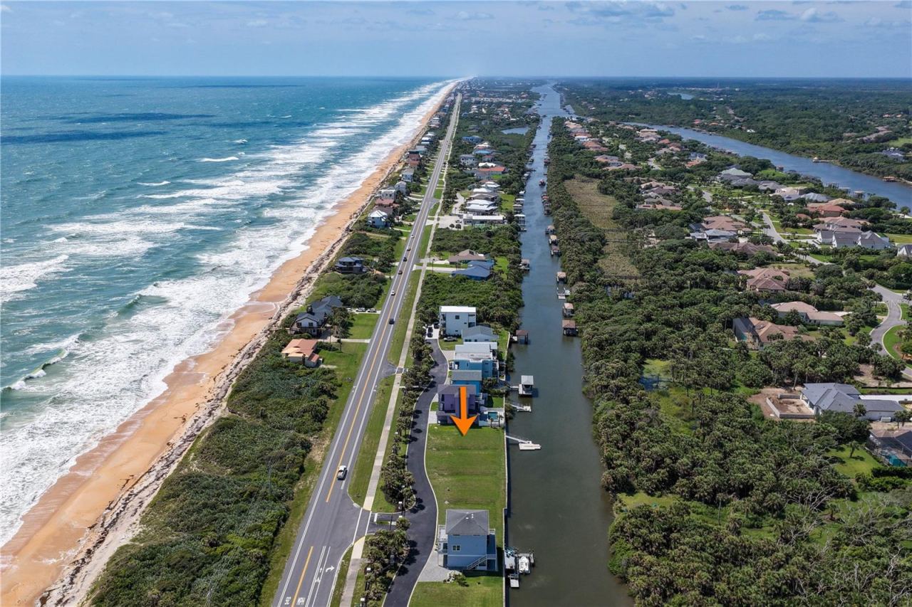 Photo 1 of 20: Home Sweet Home!! 3568 N. Ocean Shore Blvd - Your Dream Lot is Calling You!!