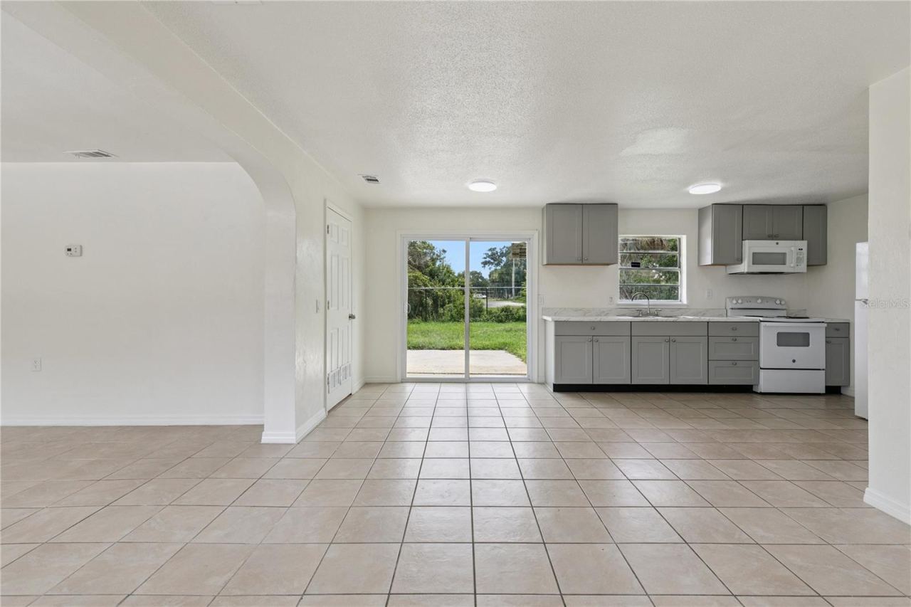 Photo 7 of 20: Open Floor Plan Kitchen with Natural Lighting