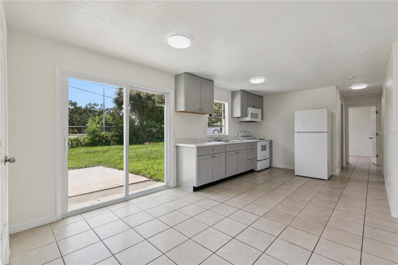 Photo 8 of 20: Kitchen with Patio Access