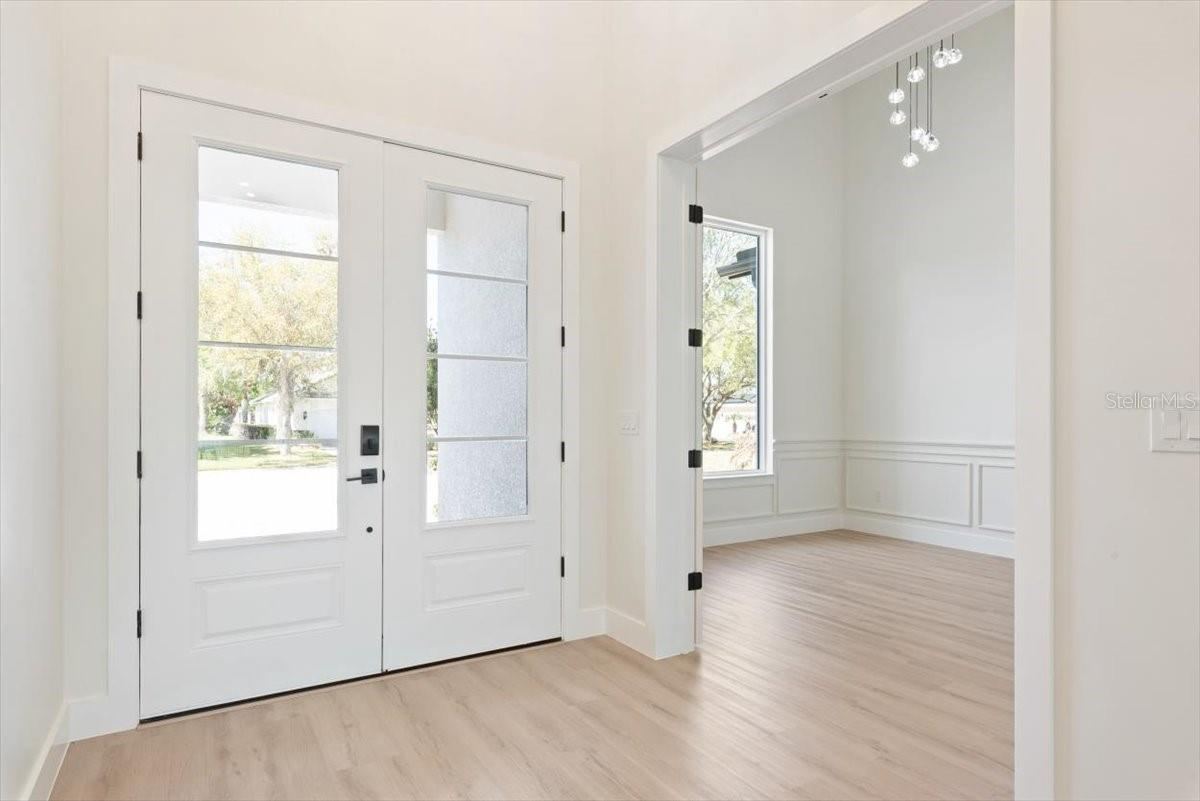 Photo 8 of 20: Foyer w/Double Front Doors