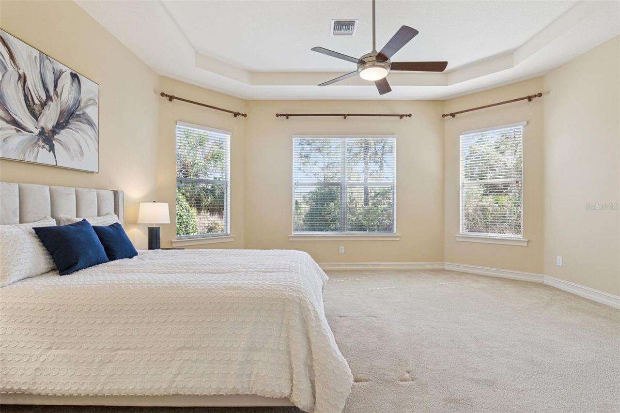 Photo 18 of 20: Primary Bedroom w/ a conservation area view