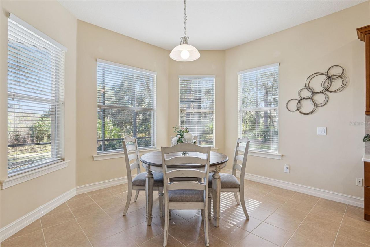 Photo 16 of 20: 13' x 12'6" Dinette area w/ a conservation area view