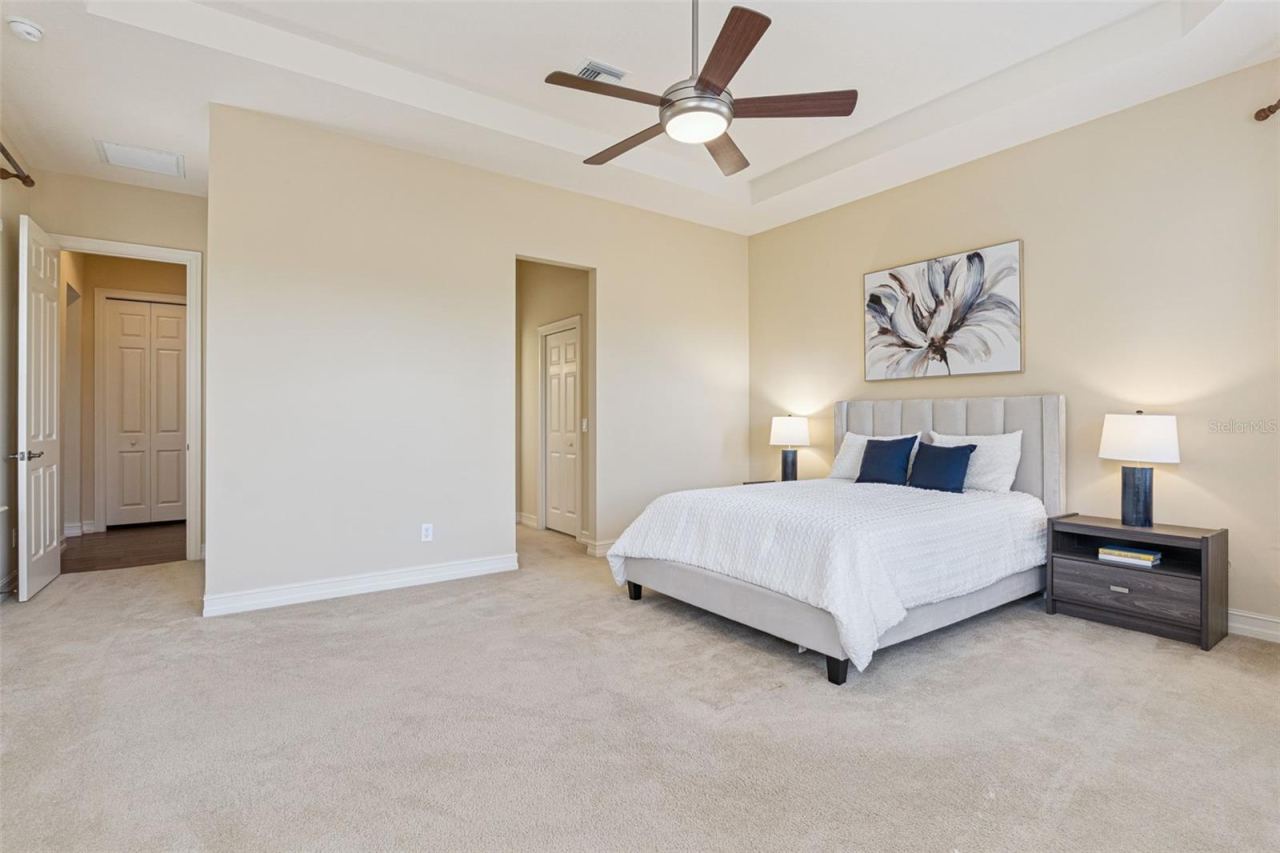 Photo 19 of 20: Primary Bedroom w/ plenty of wall space for your furniture