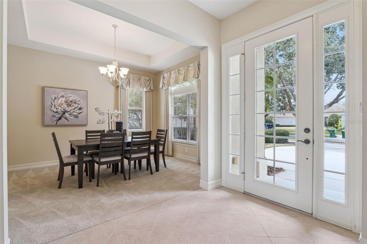 Photo 2 of 20: Foyer entryway w/ glass front door & sidelights