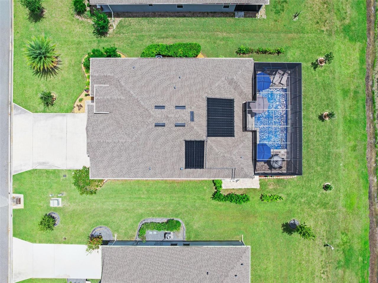 Photo 2 of 20: Home with 28x15 solar-heated pool