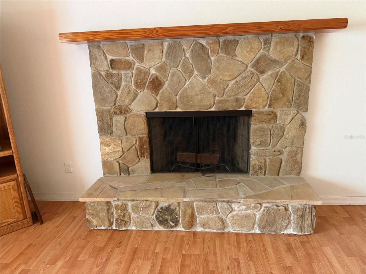 Photo 6 of 19: Stone fireplace
