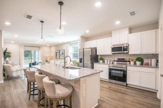 Photo 5 of 20: Model home - actual features may vary.