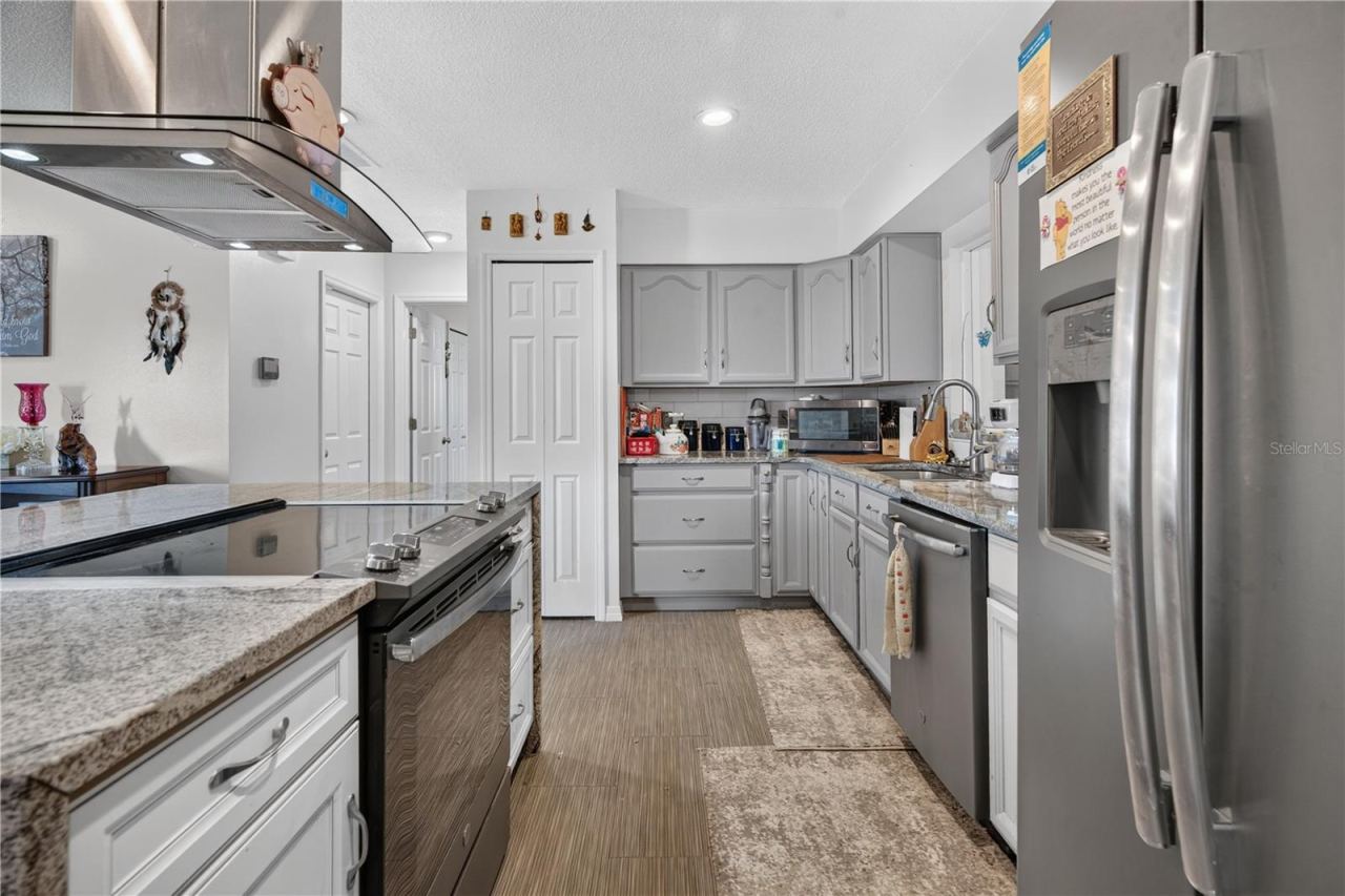Photo 10 of 20: Entire view of the Kitchen with Pantry